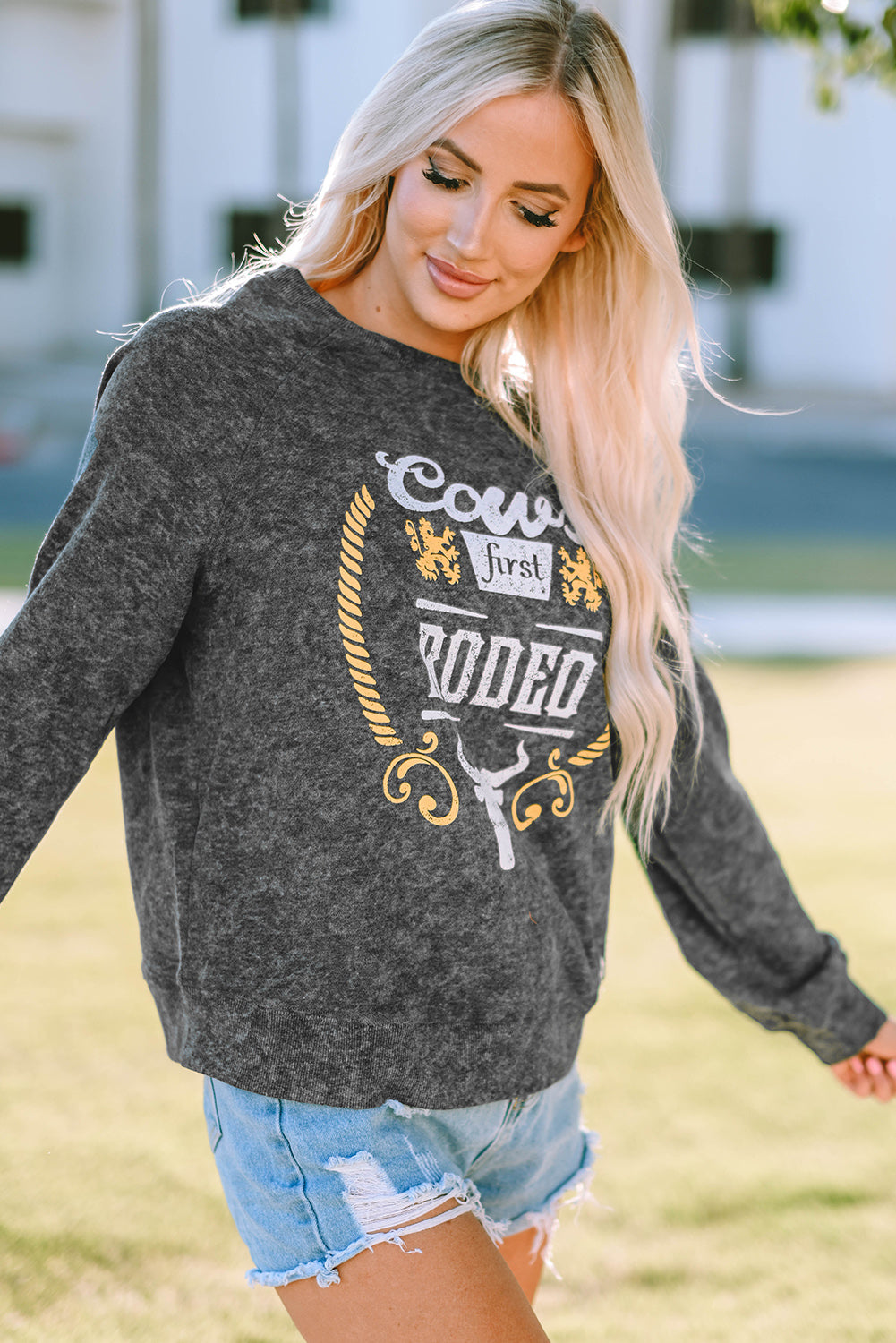 Mineral Washed COW'S FIRST RODEO Round Neck Raglan Sleeve Sweatshirt